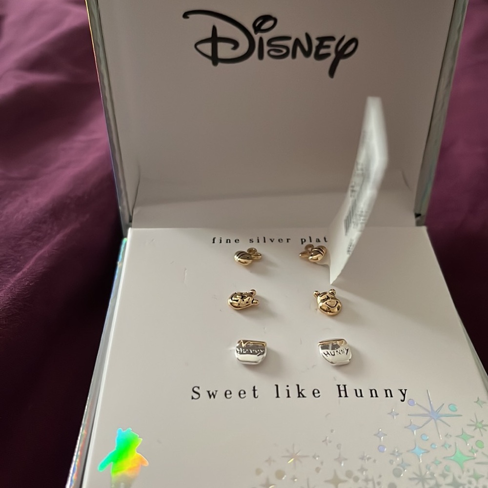 Disney earrings. Brand new in box.